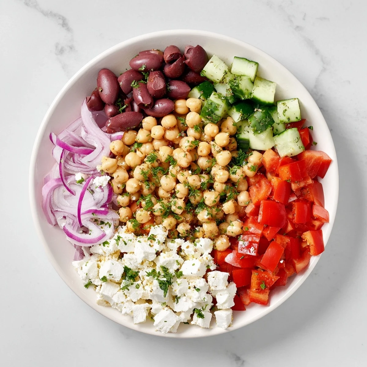 Bright Mediterranean Chickpea and Feta Bowl, a vibrant vegan dish ready in minutes.