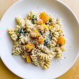 A one-pot butternut squash pasta bake with tender vegetables, ready for a comforting family meal.