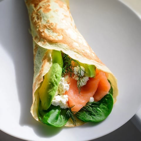 Perfectly cooked Blender-Egg Crepe Wrap with savory fillings, ready for a delicious breakfast.