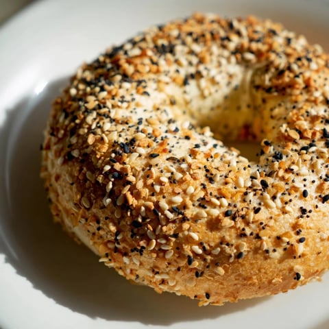Golden-brown everything bagel yogurt bagels, oven-fresh and topped with savory seasoning for breakfast.