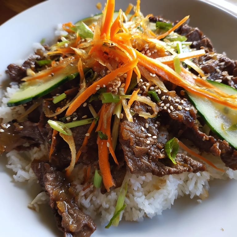 A delicious Bulgogi beef bowl: Sweet and savory beef with fresh vegetables ready to eat.