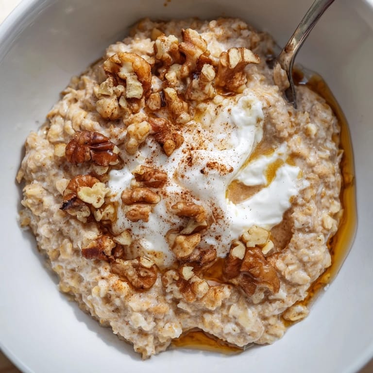 Warm, comforting bowl of Pumpkin Spice Latte Oats, perfect for a cozy fall breakfast.